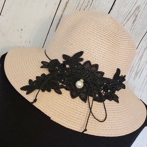 Kara & Kate paper straw sun hat blush with black flower applique and pearl charm